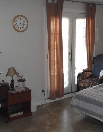 Cozy bedrooms at Casa de Paz assisted living